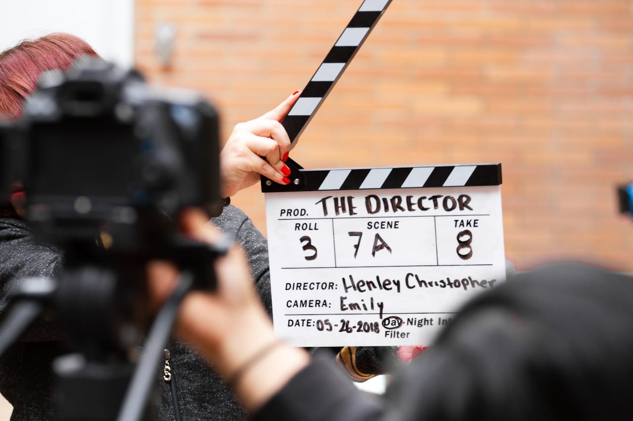 man holding clapper board 1117132